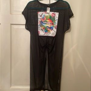 Top fashion sheer black top with lips on front *shirt has never been worn